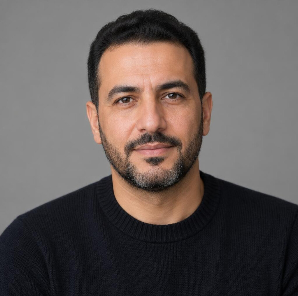 Portrait of a bearded man looking at the camera